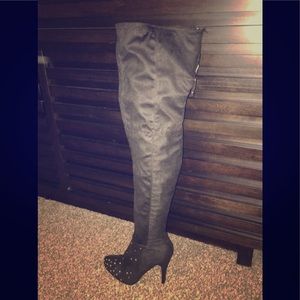 Thigh high Dollhouse black suede boots..